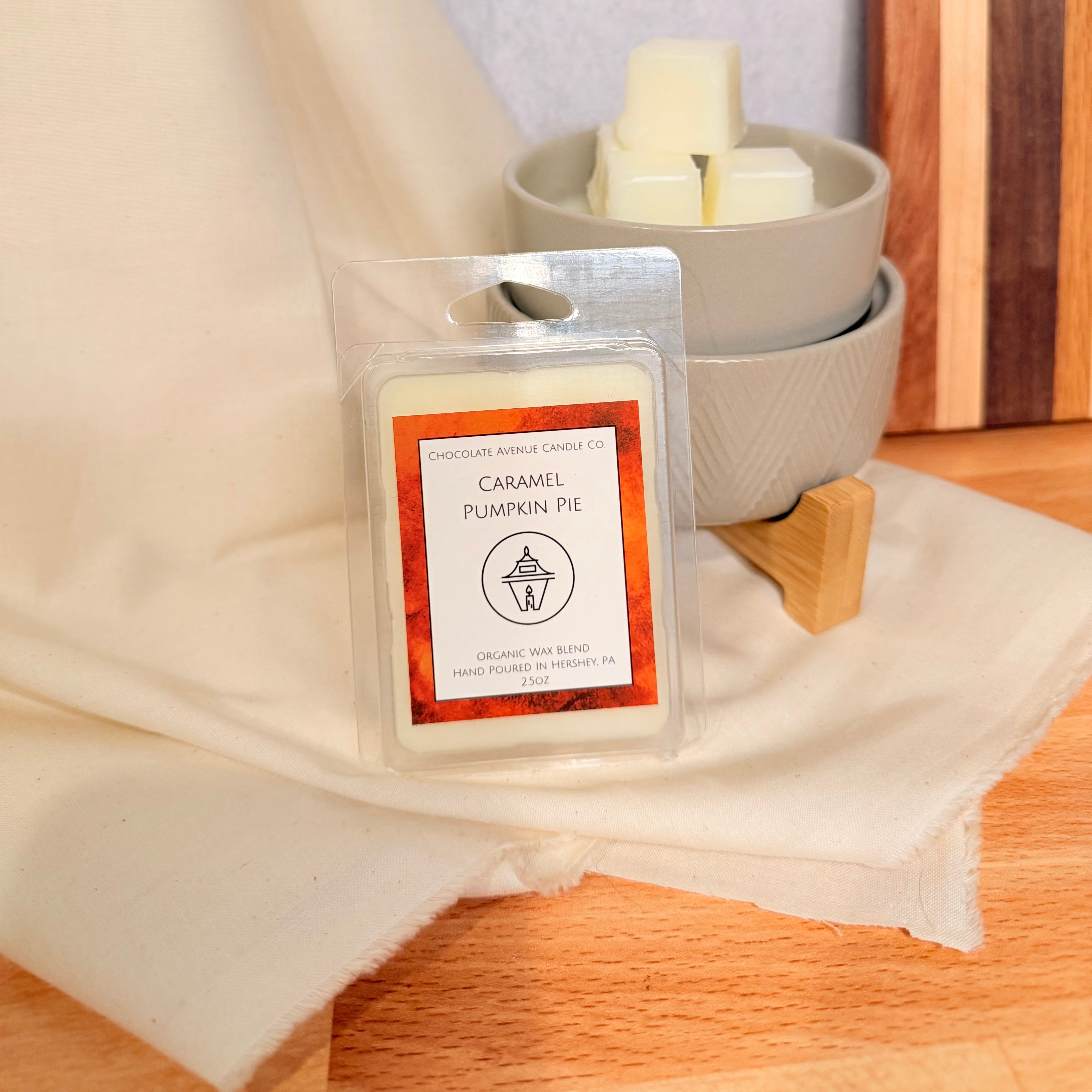 Caramel Pumpkin Pie candle in a 2.5oz clamshell with caramel and pumpkin notes.