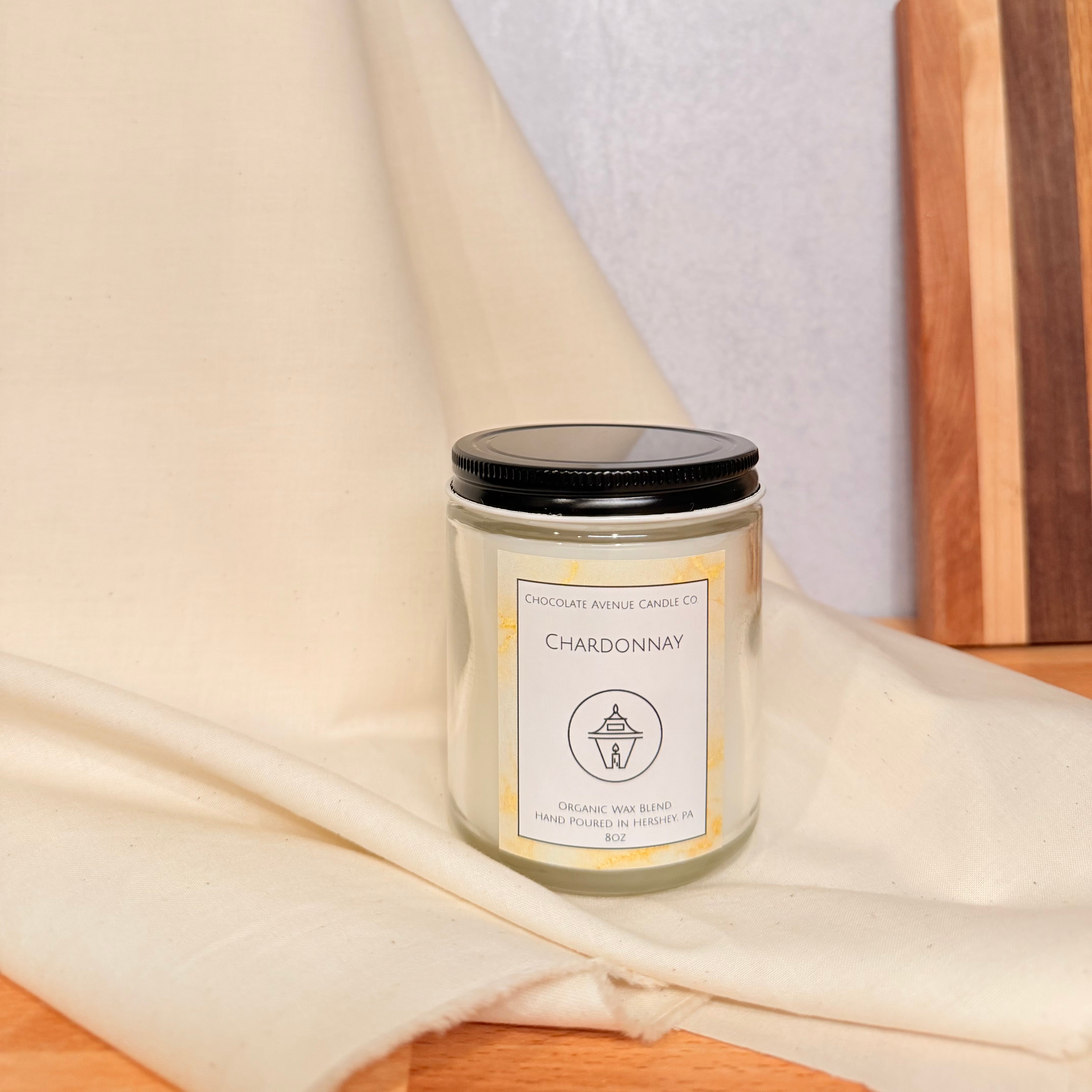 Chardonnay candle inspired by white wine with pear, citrus, and oak notes.