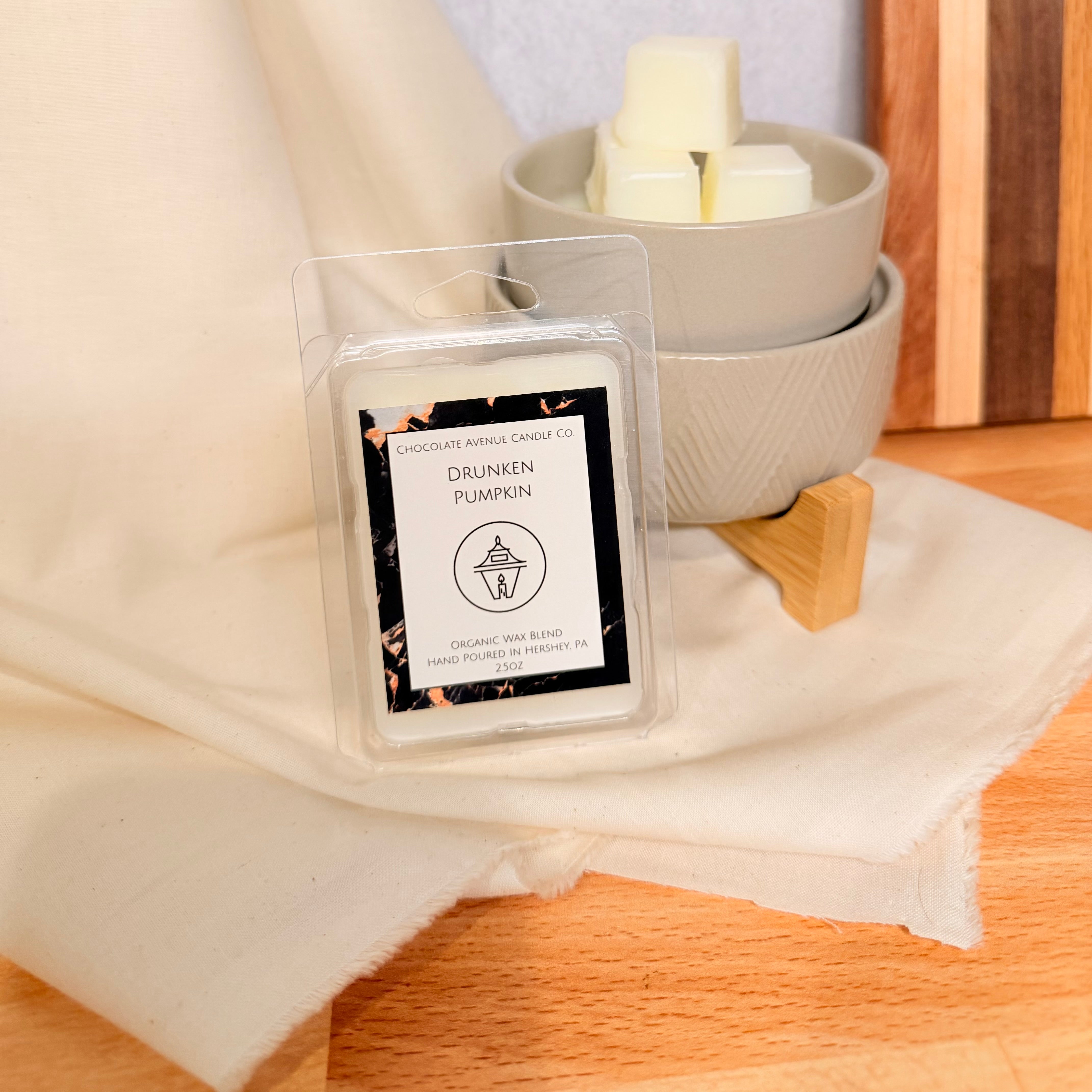 Drunken Pumpkin wax melt with pumpkin, fall spice, and spiced rum notes.