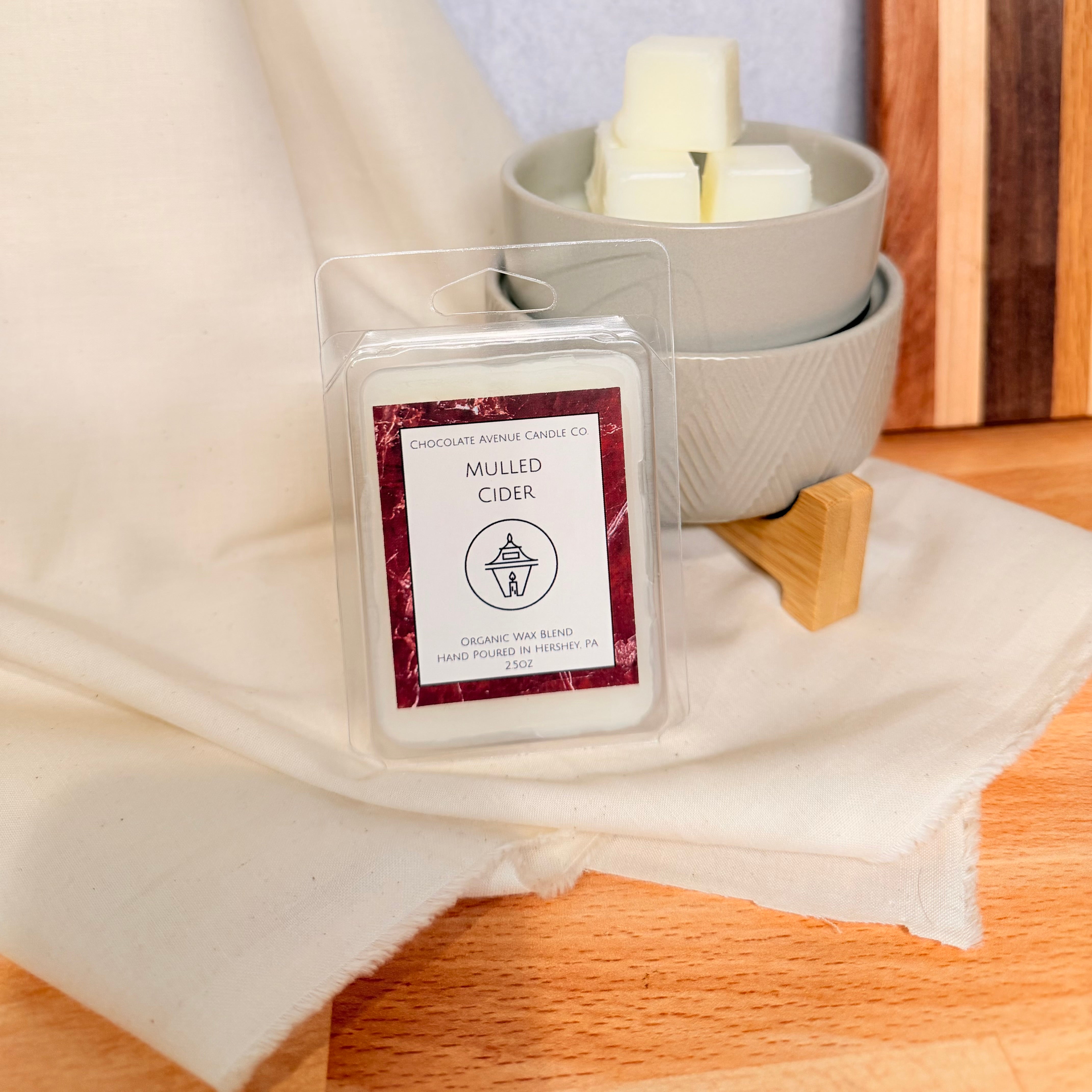 Mulled Cider wax melt with apple, orange, cinnamon, and clove notes.