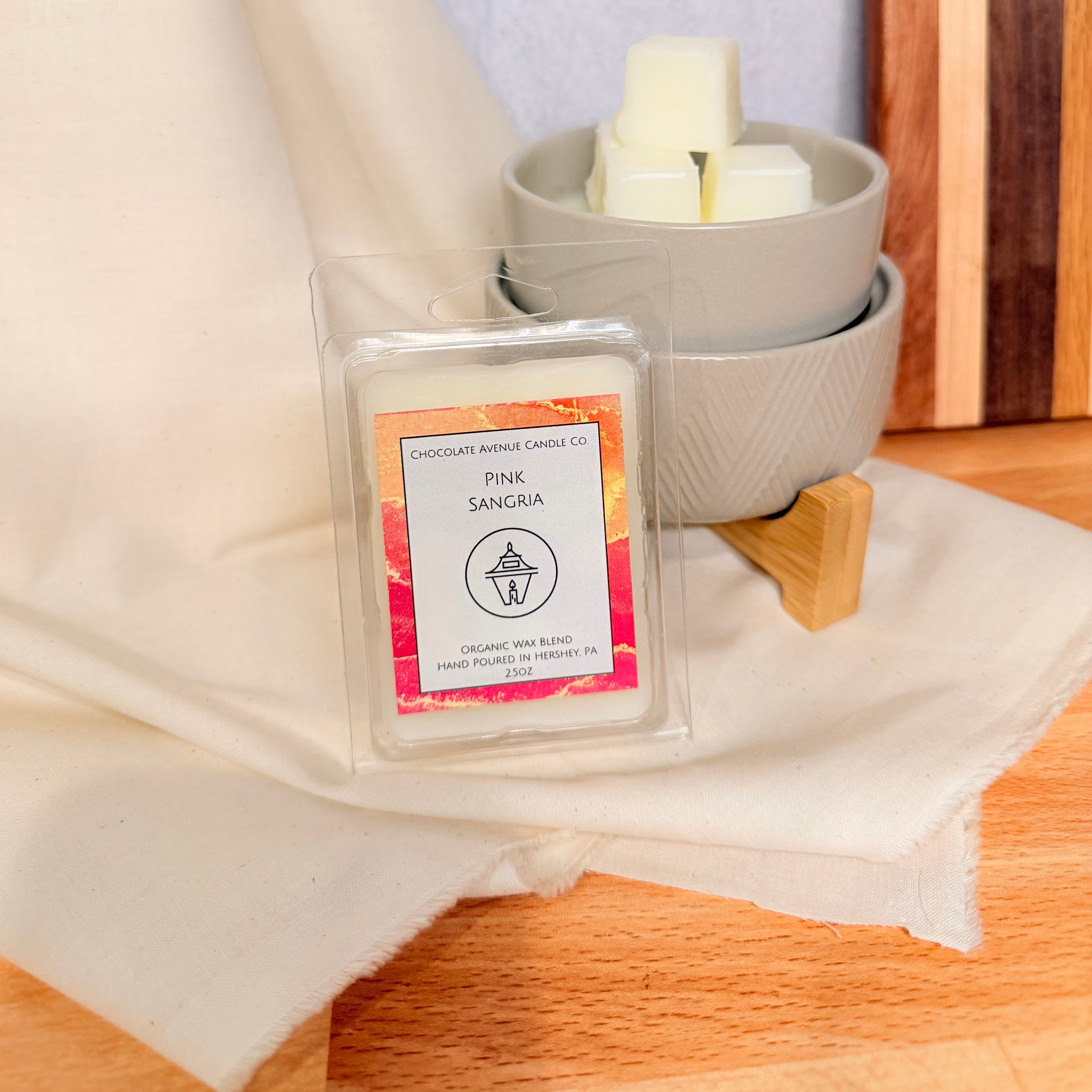 Pink Sangria wax melt with berry, citrus, and sweet wine notes.