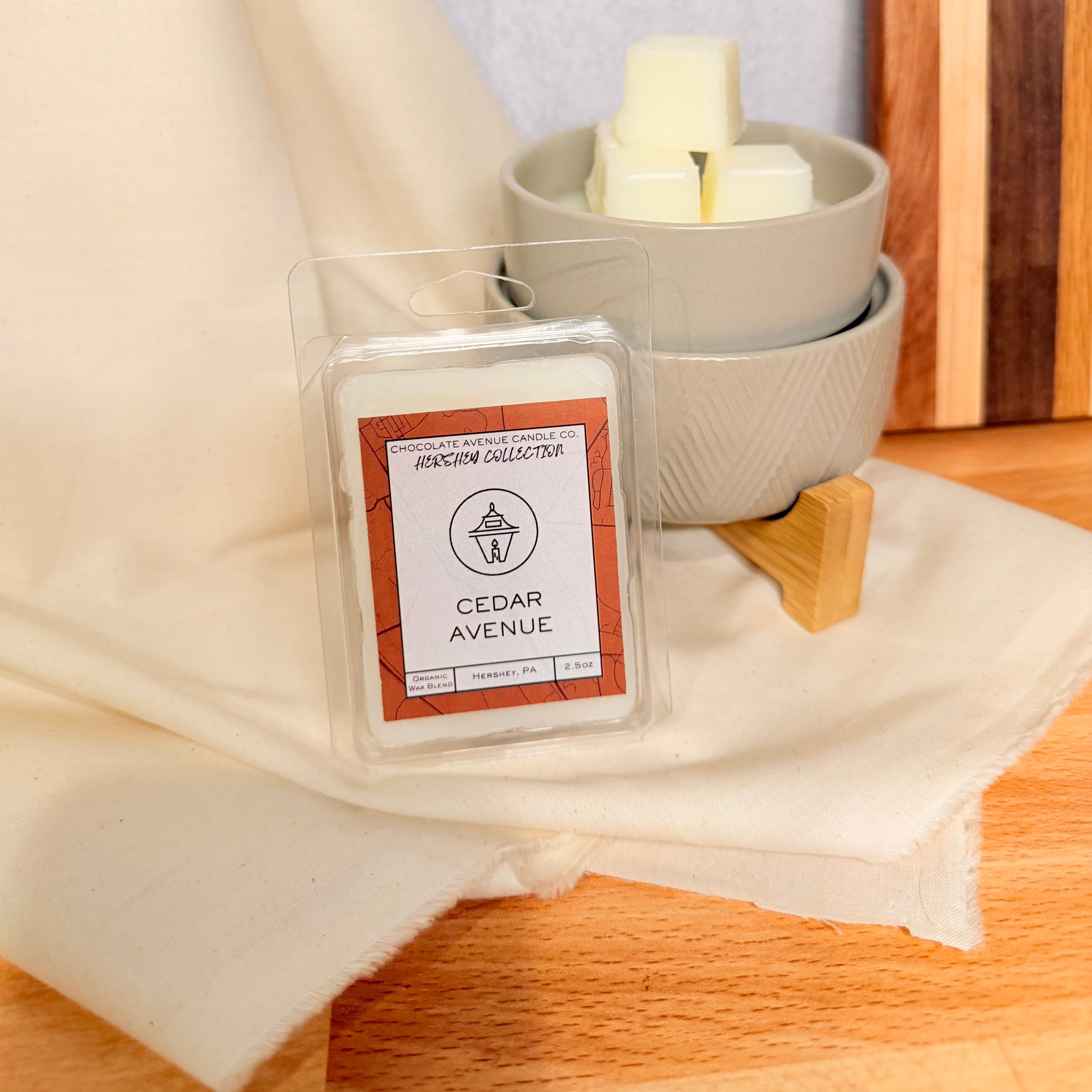 Cedar Avenue wax melt with bright citron and warm cedarwood notes.