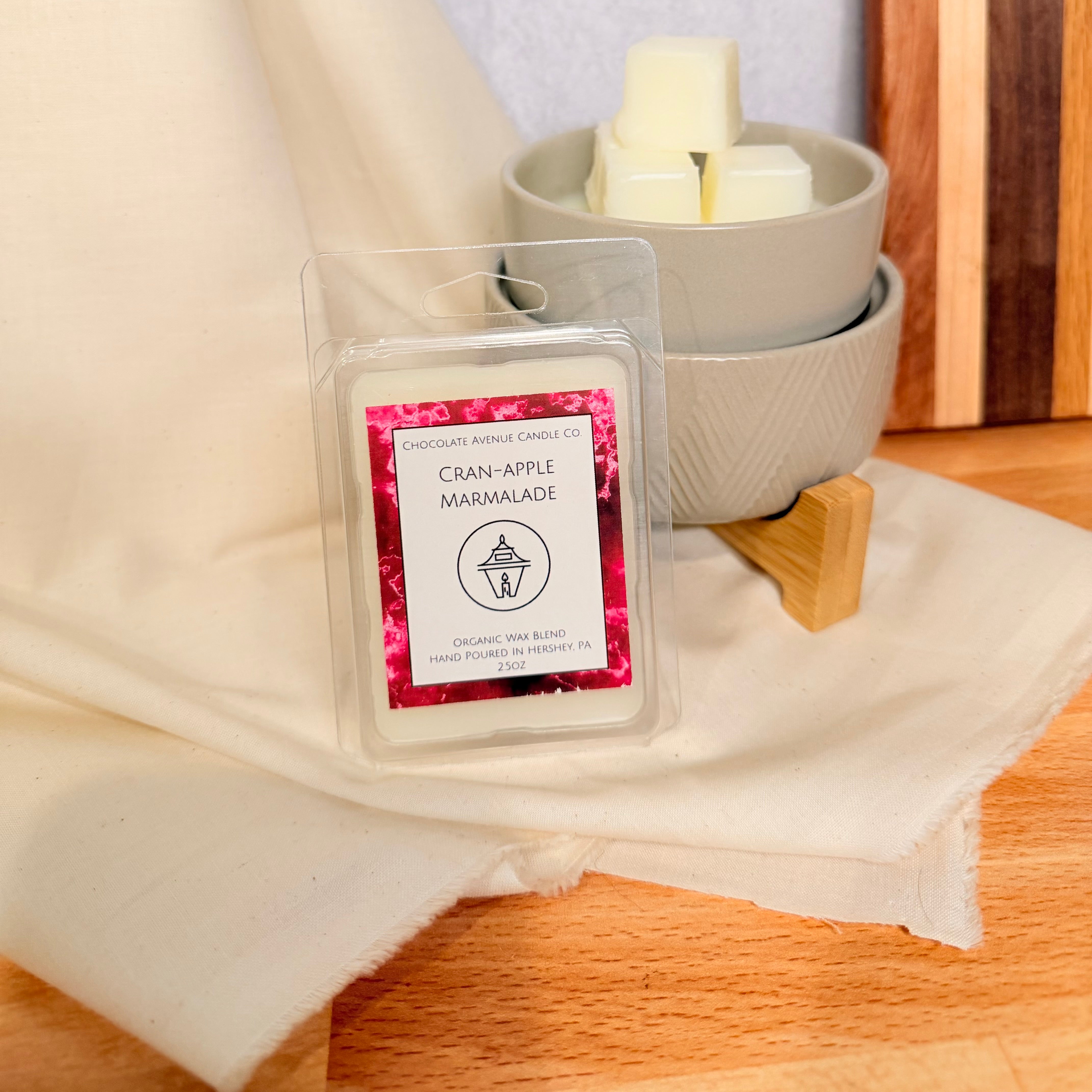 Cran-Apple Marmalade wax melt with cranberry, apple, and cinnamon sugar notes.