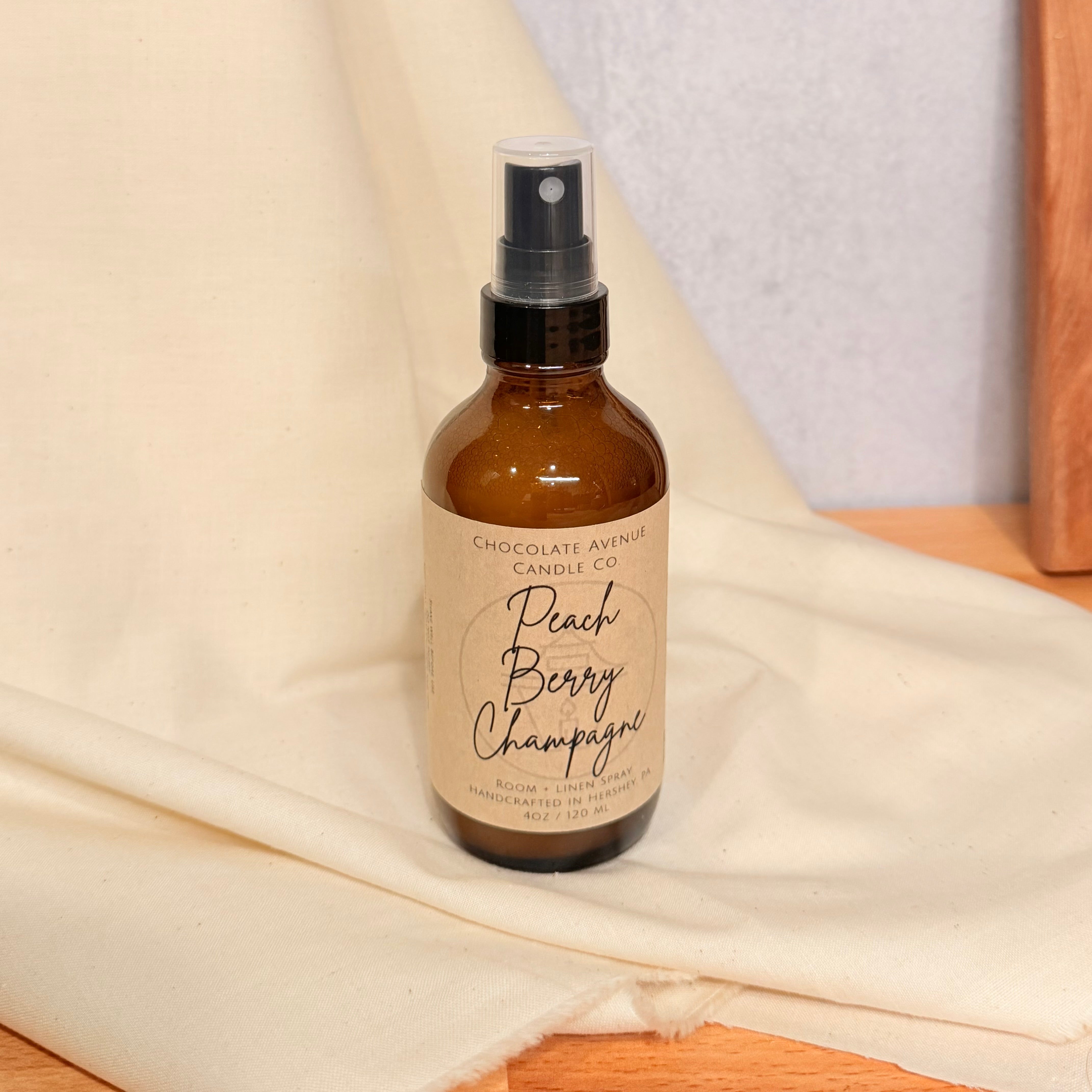 Peach Berry Champagne room spray with juicy peach, berry, and sparkling champagne notes.