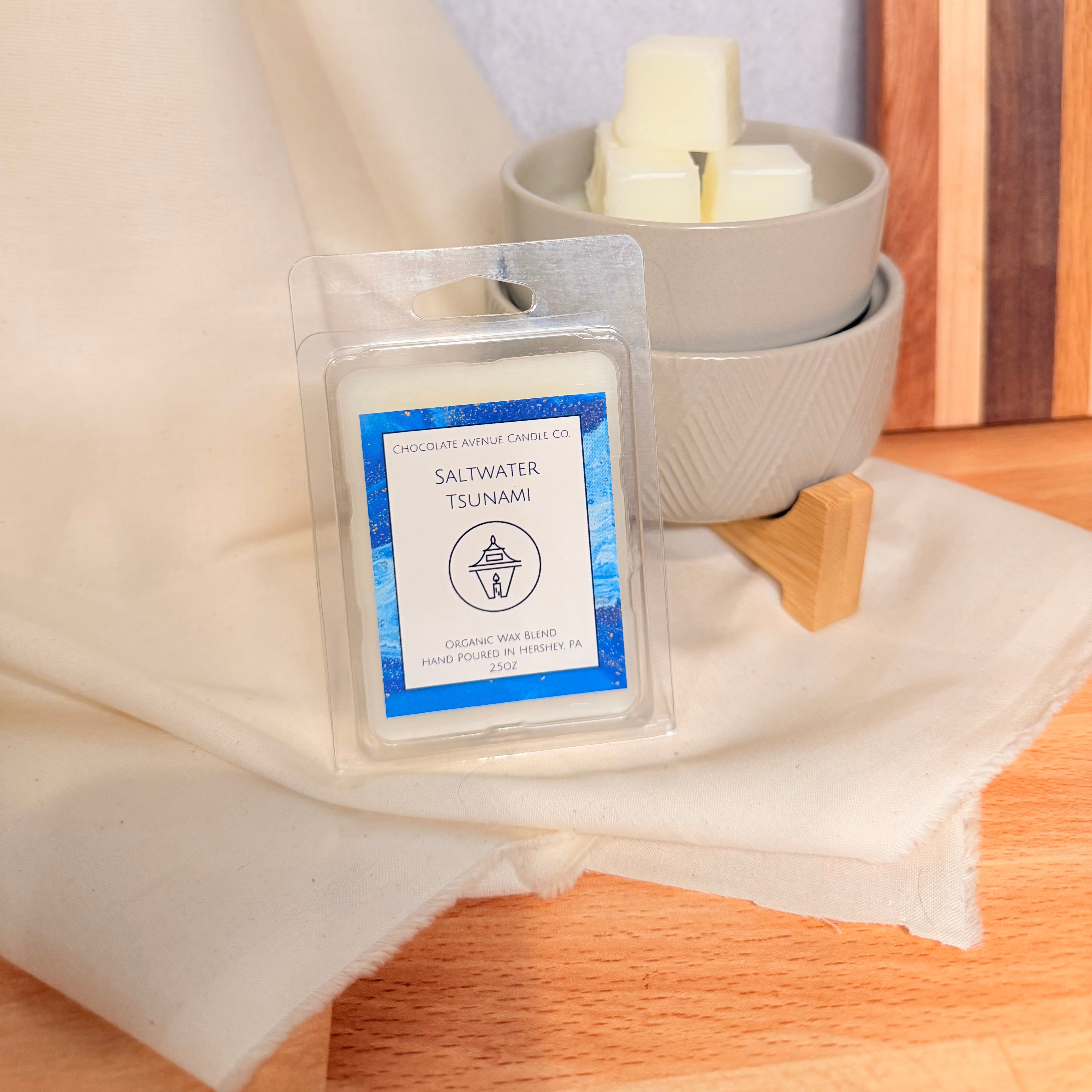 Saltwater Tsunami wax melt with sea air, salty seaweed, and ozone notes.