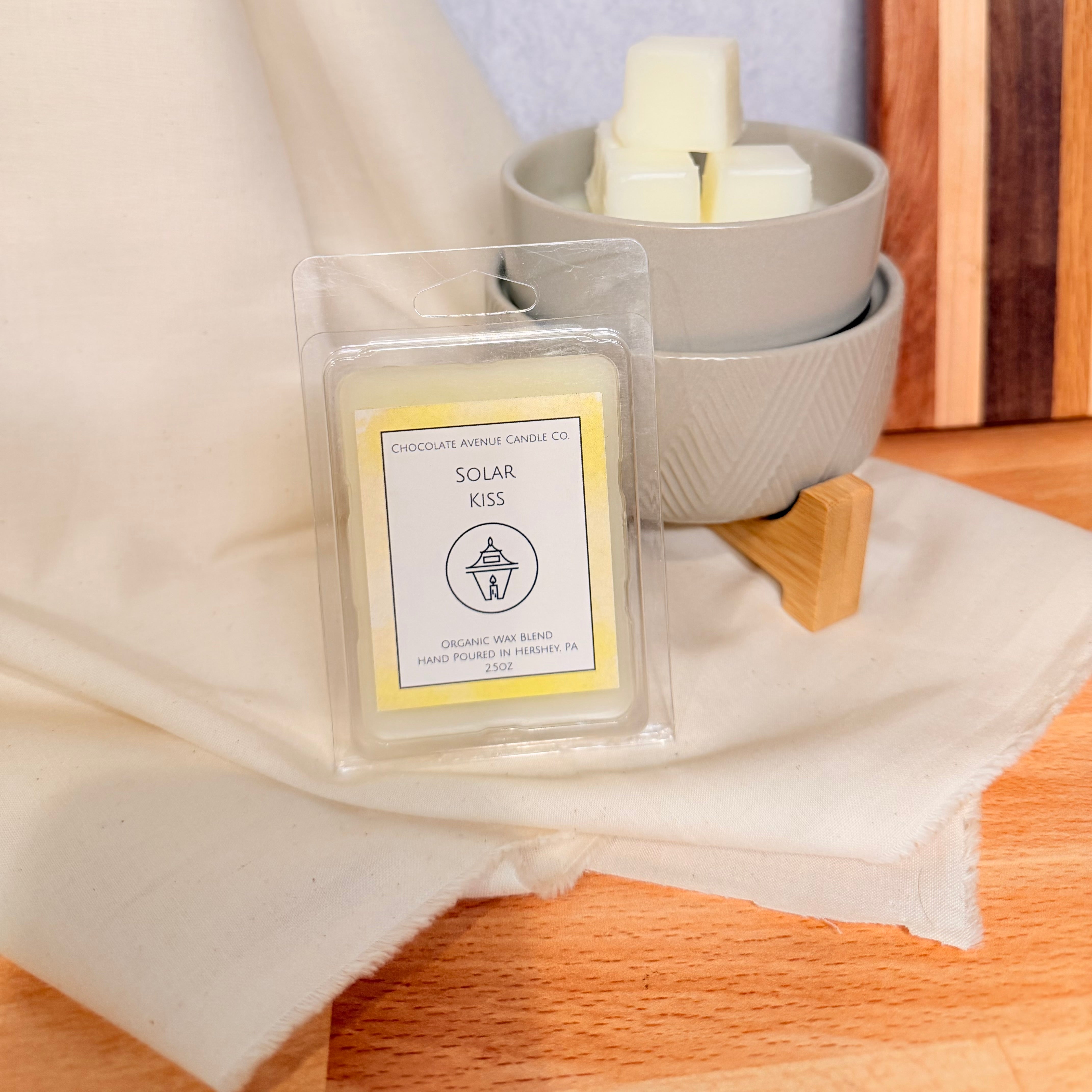 Solar Kiss wax melt with pistachio, coconut cream, salted caramel, tonka, and exotic musk notes.