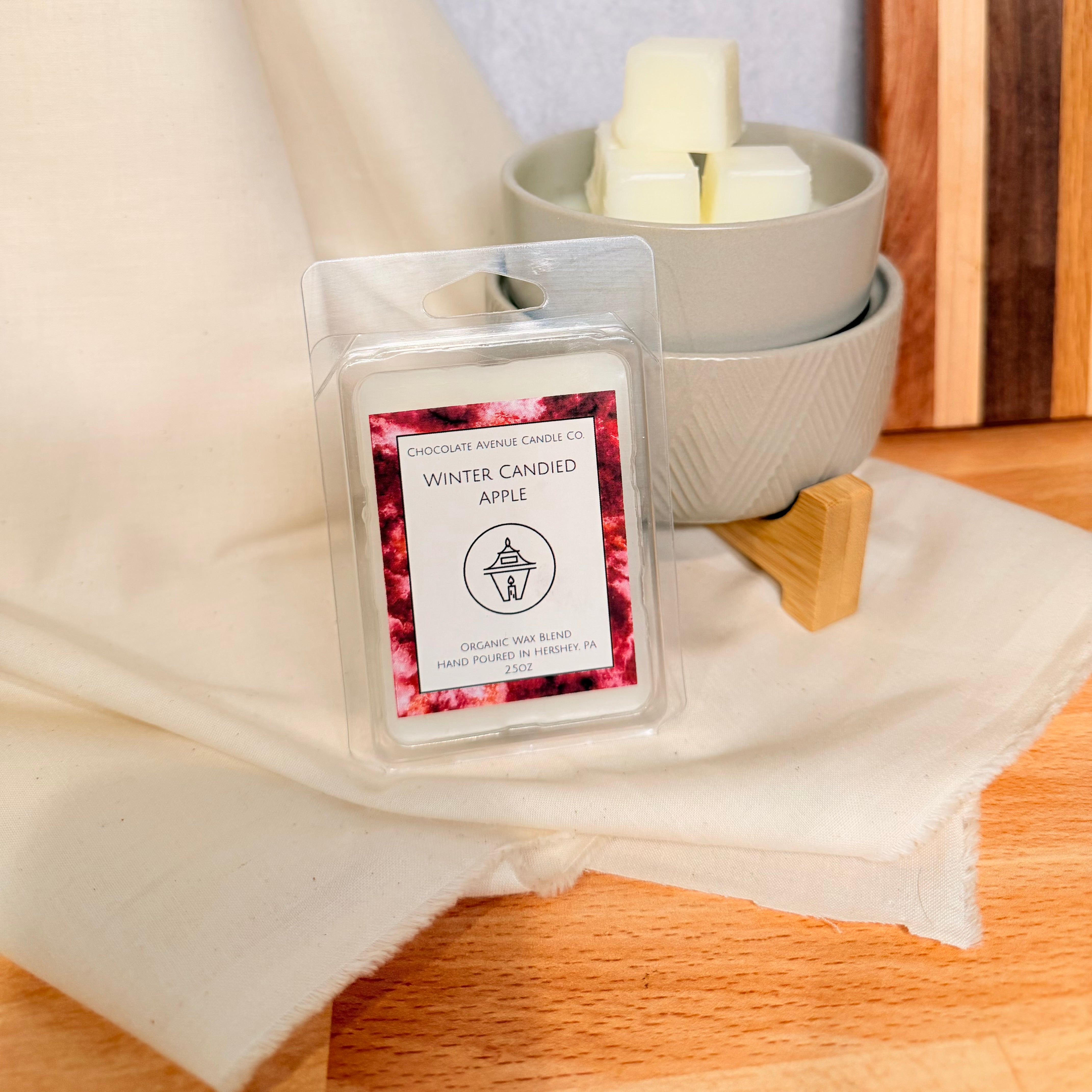 Winter Candied Apple wax melt with crisp apple, cinnamon, and candied orange notes.